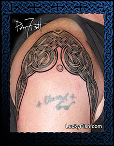 Celtic knot tattoo on shoulder with 'Lucky Fish' branding.