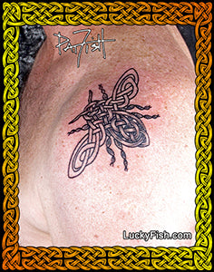 Tattoo of Celtic honey bee design on shoulder by Pat Fish