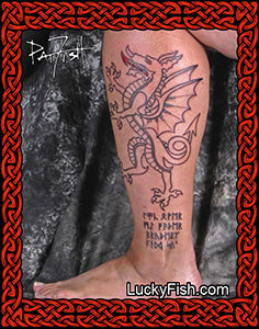 Tattoo of a dragon design on a person's leg with 'Lucky Fish.com' branding.