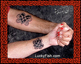 Two arms with matching Celtic knot heart tattoos by Pat Fish featuring LuckyFish.com branding.