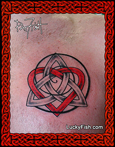 Tattoo design of a red and black Celtic heart knot on skin with Pat Fish signature and 'Lucky Fish' branding.