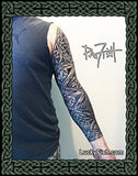 Tattoo sleeve on a person's arm with intricate knotwork Celtic designs, signed by 'Lucky Fish'.