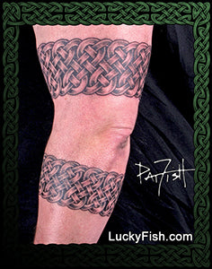 Celtic knot tattoo bands on a person's arm with 'Lucky Fish' branding.