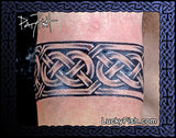 bold warrior tattoo knot arm band
