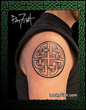 Tattoo of a Celtic knot design on a person's shoulder with 'Lucky Fish' branding.