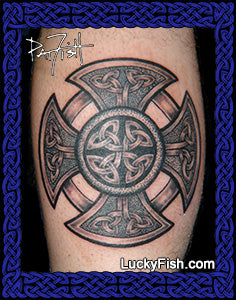 Celtic cross tattoo on a person's arm with Lucky Fish branding.