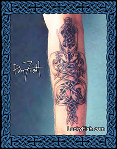 Tattoo on a forearm with intricate reindeer Celtic design, signed by Lucky Fish