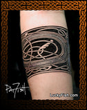 Celtic Tattoo design on a person's arm with 'Lucky Fish' branding.