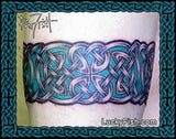 Celtic knot tattoo on a person's arm by Pat Fish of luckyfish.com