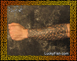 photograph of celtic gauntlet knot sleeve