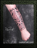 celtic forearm tattoo with bold lines