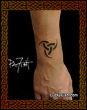 Tattoo of the Nordic horns of Odin design on a person's forearm with 'Lucky Fish' branding.