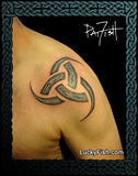 Viking Horns of Odin tattoo on shoulder with 'Lucky Fish' branding