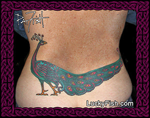 Tattoo of a peacock design on a person's back with 'Lucky Fish' branding.
