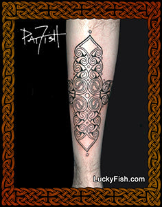 Tattoo design on a leg with intricate spiral patterns and LuckyFish watermark.