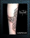 Pictish tattoo design on a arm with 'Lucky Fish' branding.