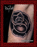 Black rose tattoo on a person's arm with 'LuckyFish.com' branding.