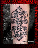 Celtic heart knot tattoo on a person's arm with 'Lucky Fish' branding.