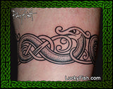 Tattoo of a Celtic knot design Viking tattoo on skin with Lucky Fish branding.
