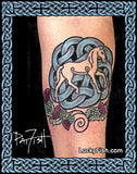 Tattoo of a Pictish horse and thistles and Celtic knot design on a person's arm, with 'Lucky Fish' branding.
