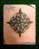 Celtic compass knot design on skin with green accents, artist Pat Fish signature, and website luckyfish.com