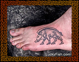 pointillist pig tattoo on foot