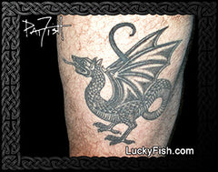Dragon tattoo wyvern on a person's arm with LuckyFish branding.