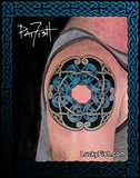 Tattoo of a Celtic knot design on a shoulder with 'Lucky Fish' branding.