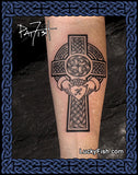 Celtic claddagh cross tattoo on a person's arm with 'Lucky Fish' branding.