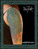 Celtic Tattoo design on a person's arm with intricate patterns by Pat Fish