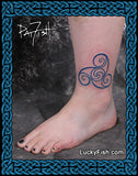Tattoo of a Celtic spiral knot circle design on a foot with luckyfish branding by Pat Fish