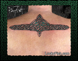 Tattoo of a Celtic design with triquetra and knotwork on upper back skin with 'Lucky Fish' branding.
