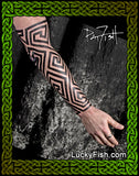 Tattooed arm with geometric pattern from Pictish stone carvings tattooed by Pat Fish of  'LuckyFish.com' 