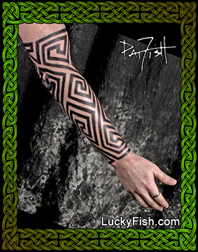 Tattooed arm with geometric pattern from Pictish stone carvings tattooed by Pat Fish of  'LuckyFish.com' 