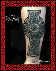 Tattoo of a Celtic cross design on a person's arm with 'Lucky Fish' branding.