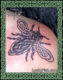 Celtic knot tattoo of a bee on a shoulder with  'Lucky Fish' branding.