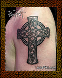 Celtic cross tattoo by Pat Fish on a person's arm with  'Lucky Fish' branding.