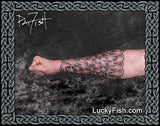 Person with a Celtic tattoo sleeve on their arm by Pat Fish featuring the brand 'Lucky Fish'.