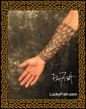 Arm with intricate Celtic tattoo sleeve by Pat Fish of luckyfish.com