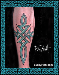 Celtic cross tribal tattoo design on a person's leg with 'Lucky Fish' branding.