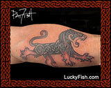 Celtic lion arm tattoo