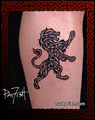 celtic knot heraldic lion tattoo on leg with LuckyFish branding