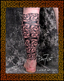 Tattoo filling a leg with intricate Celtic design, made of Celtic knotwork, by Pat Fish