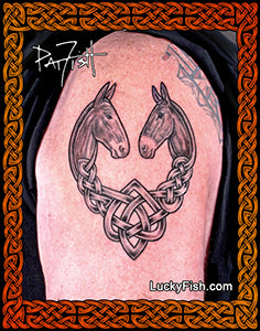 Tattoo of two mules in a Celtic knot design on a person's arm, with 'Lucky Fish' branding.