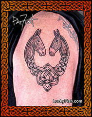 Tattoo of two mules in a Celtic knot design on a person's arm, with 'Lucky Fish' branding.