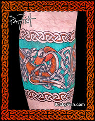 Tattoo design on skin with Celtic knot patterns and Irish Wolfhound dogs