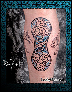 Tattoo of a double disc Pictish design on a person's leg calf with 'Lucky Fish' branding.
