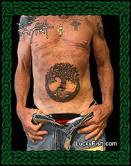 Person with stomach tattoo of a tree of life, with LuckyFish.com branding.