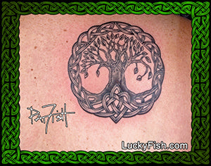 Tattoo of a Celtic knot tree of life design on skin with Pat Fish signature and 'Lucky Fish' branding.