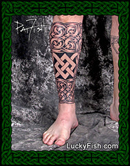 Celtic tattoo filling lower leg with full knotwork coverage  and LuckyFish.com branding.